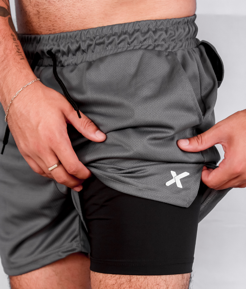 SHORTS DRY-FIT 2 EM 1 DE COMPRESSÃO NEXT
